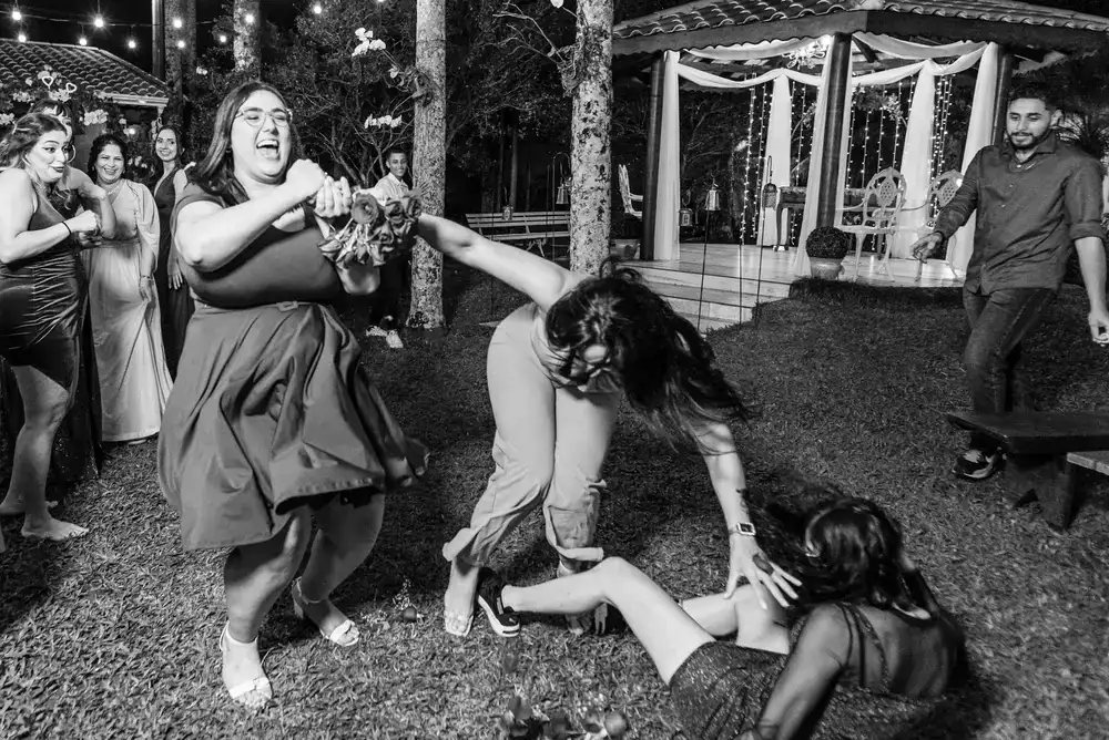 Candid moment of wedding guests laughing
