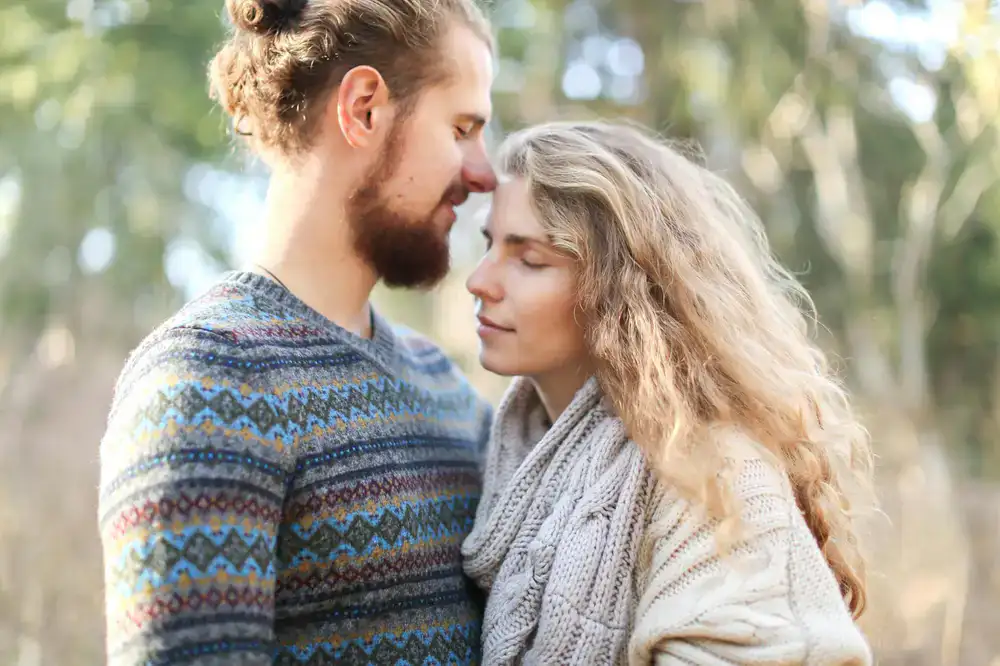 Couple embracing in soft natural light