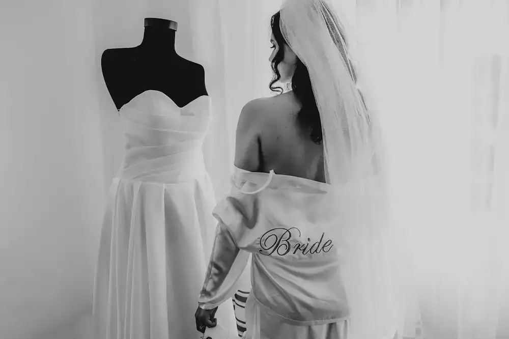 Bride preparing in the morning light